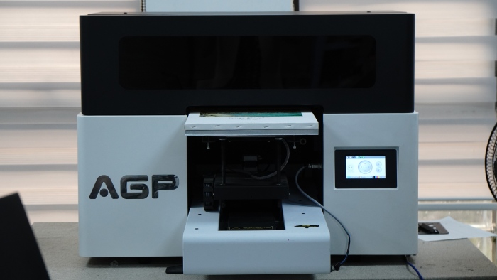 UV3040 Flatbed UV Printer CMYK+White+Varnish for High-Quality Customized Printing
